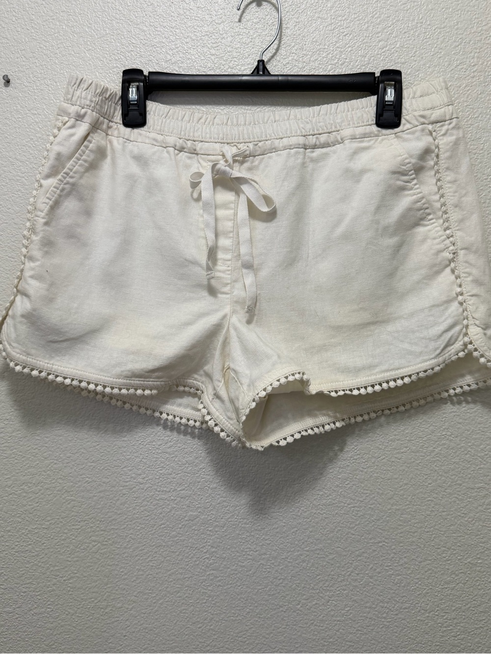 Loft white lined running shorts with pom pom trim, size med